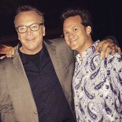 Dr. Alan J. Bauman with Actor Tom Arnold