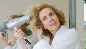 Plenty Of 50+ Women Complain About The Seasonal Syndrome Of Thinning Hair. — Getty Images